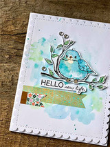 Watercolor card in teal and green washes: the pastel bird on its branch beside a “HELLO new life.” banner.