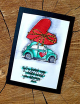 Framed card of a teal bug car with a red heart on a black background.