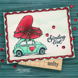Card of a mint bug car with a red heart on a red frame, "Sending love."
