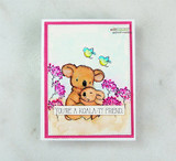 Pink-framed card of the koala mama and joey among blossoms and birdies.