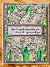 Card with a colored lily-of-the-valley background in greens and whites behind a 'When things change inside you... things change around you.' sentiment strip.