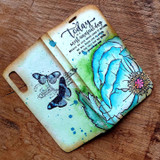 Card of a blue poppy and butterfly on a soft wash, 'today is a most unusual day.'