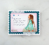 Card of the colored girl in a soft dress on a striped panel with the wind-and-sun blessing.