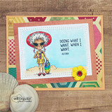 Card with retro geometric papers and a yellow flower; grandma in a red sun hat and floral top stands beside a speech bubble reading 'DOING WHAT I WANT, WHEN I WANT. -RETIRED.'