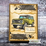 Masculine card with a vintage green Scout SUV and tire-track grunge over 'Say yes to adventure.'