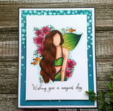 Card with the mermaid framed by pink florals on a teal heart panel, 'wishing you a magical day.'