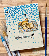 Card of the colored puppy on a blue dotted panel, "Somebody needs a hug."