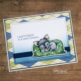 Plaid card of the gray puppy on its bed with a blue heart.