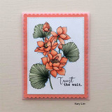 White card with the lotus colored in coral and sage on a blush frame, 'Trust the wait' stamped below.