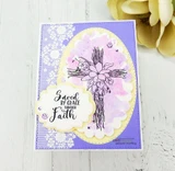 Handmade card featuring a delicate floral cross, with the sentiment "Saved by grace through faith."