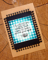 Teal dotted kraft card of the He-will-cover-you Psalm 91 verse with pom-pom border