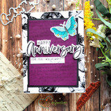 Handmade card featuring a flowing handwritten script background, with the sentiment "By His wounds we are healed."