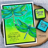Two vividly colored dragonflies on a green card, 'let the morning bring me word of your unfailing love'.