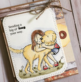 Kraft tag card with the girl hugging a golden dog, 'Sending a big ol' hug your way.'