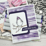Handmade card, 'A little birdie told me,' with a bird over purple watercolor stripe paper.