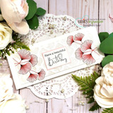 White doily scene with red-tipped ginkgo sprays around a 'Have a beautiful birthday' panel