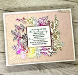 Card of the floral frame in soft rainbow tones with the encouragement sentiment on kraft.