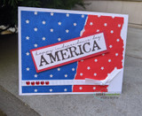 Card with "AMERICA" over a red, white and blue star-and-stripe background.