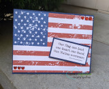 Soft card with the flag lightly stamped and 'one flag, one land, one heart, one Nation evermore.'
