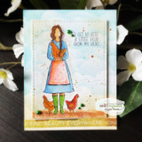 Handmade card with a stenciled cloud and sky background made using the stencil.