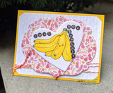 Card with bananas on a floral heart, 'love you bunches.'