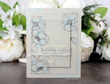Tone-on-tone embossed poppy card with 'birthday wishes' banner and twine