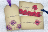 Handmade card featuring a delicate floral stem, with the sentiment "blessed."