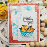 The peach-bowl stamp on a distressed plaid layered card with soft blue splatter and the peachy sentiment.