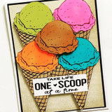 Bold card with four vivid ice cream scoops in green, orange and teal stacked high.