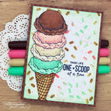Card with a big brown-and-pink ice cream cone on a doily with 'ONE SCOOP at a time.'