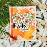 Watercolor card with the leaf heart and 'thanks, my friend' over an orange wash.