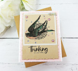 The flying swallow on a kraft card, with "Thinking of you today."