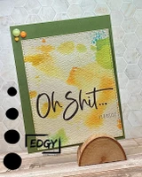 Watercolor splash card in yellow and orange stamped 'Oh sh*t… I forgot' with EDGY tag