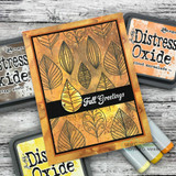 Warm distress-inked leaf print card with 'Fall Greetings.'