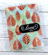 Bright leaf-print background card with 'love you.'