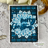 Blue snowflake cluster on plaid, 'merry Christmas.'