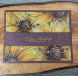 A card project showing a full-panel daisy background, paired with the greeting "Hello lovely."