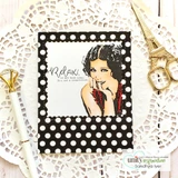 Black polka-dot framed card. Relax, we are both crazy, it's not a competition.