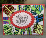 'holly jolly' with stamped ornaments and gingerbread accents on a striped card.