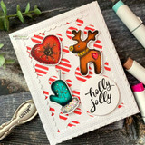 Multiple holiday sentiments arranged together on a bright card sample.