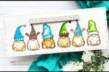 Slimline card with six colorful gnomes in a row over a printed note.