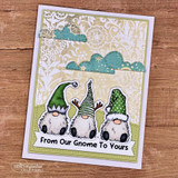 Card with three gnomes under stamped clouds and 'From Our Gnome To Yours.'