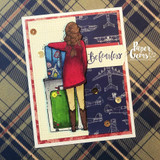 Card of the girl in red over airplane-print plaid papers, sample sentiment 'Be fearless.'