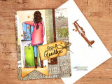Card of the adventure girl on vintage papers with a die-cut plane, sample sentiment 'Stop & breathe.'