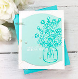 Graciellie Design's mason jar of cotton stems with 'simply blessed' and 'grateful,' a red rubber stamp shown on a handmade encouragement card.