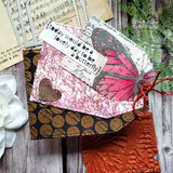 Card with a dotted background on folded projects with a heart accent.
