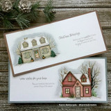 A cozy home framed by snowy evergreens stamped in red rubber and colored on a handmade card reading "May your home be filled with the wonder and joy of the season."