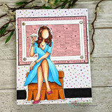 Woman in a blue dress with a cocktail over a pink 'Happy Birthday' word background.