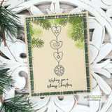 Kraft card of the ornament string framed by stamped pine boughs.