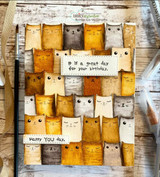 Warm orange card with the peeking cats colored in golds, 'It's a great day for your birthday.'